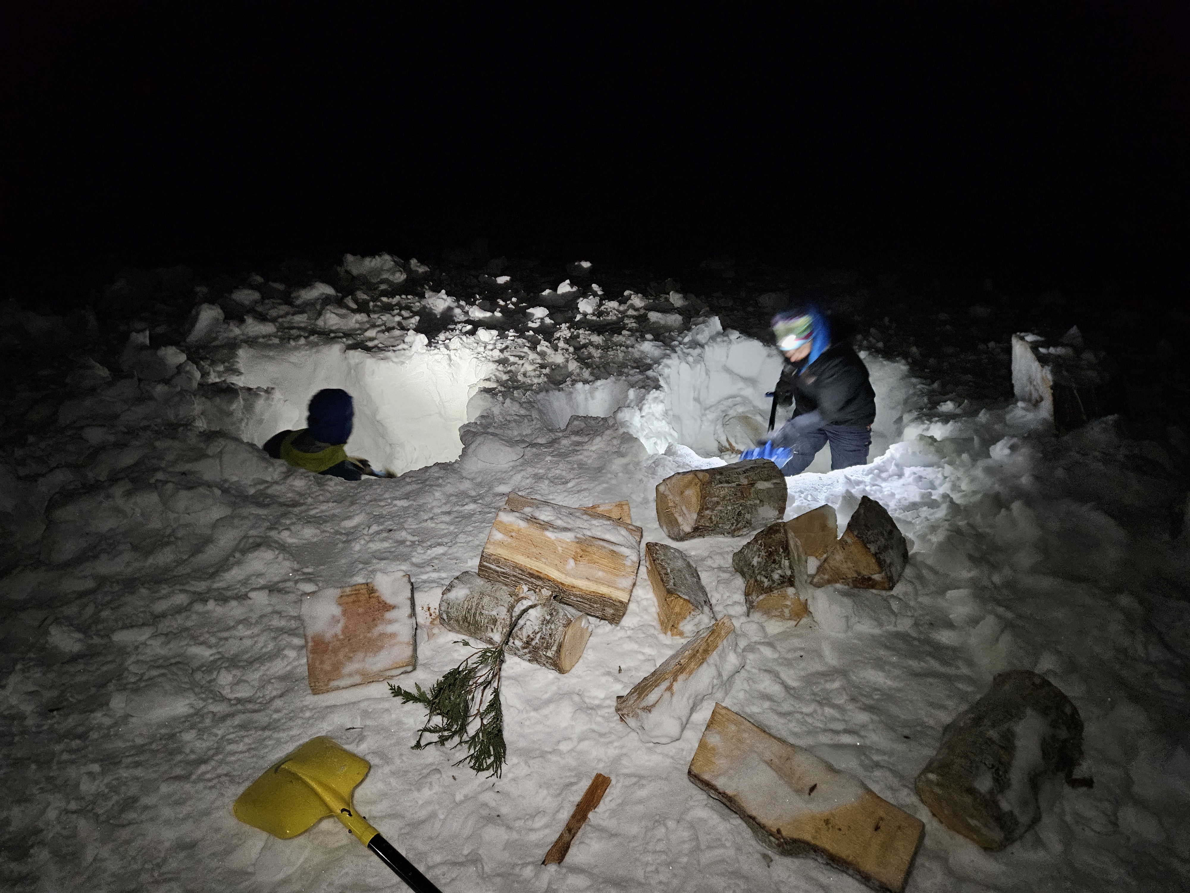 Anna and I excavating firewood out from under the snow