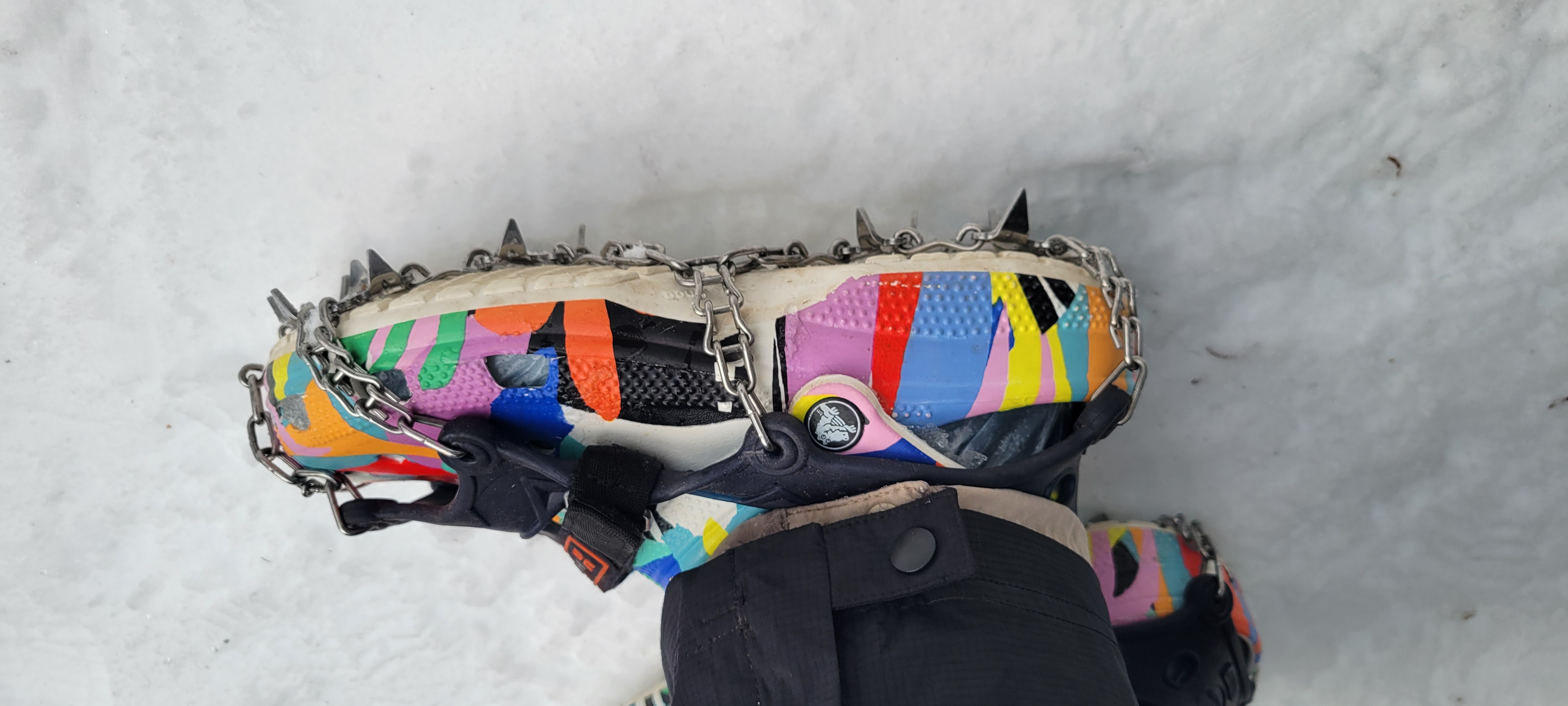 Microspikes over crocs over newspaper bags over socks