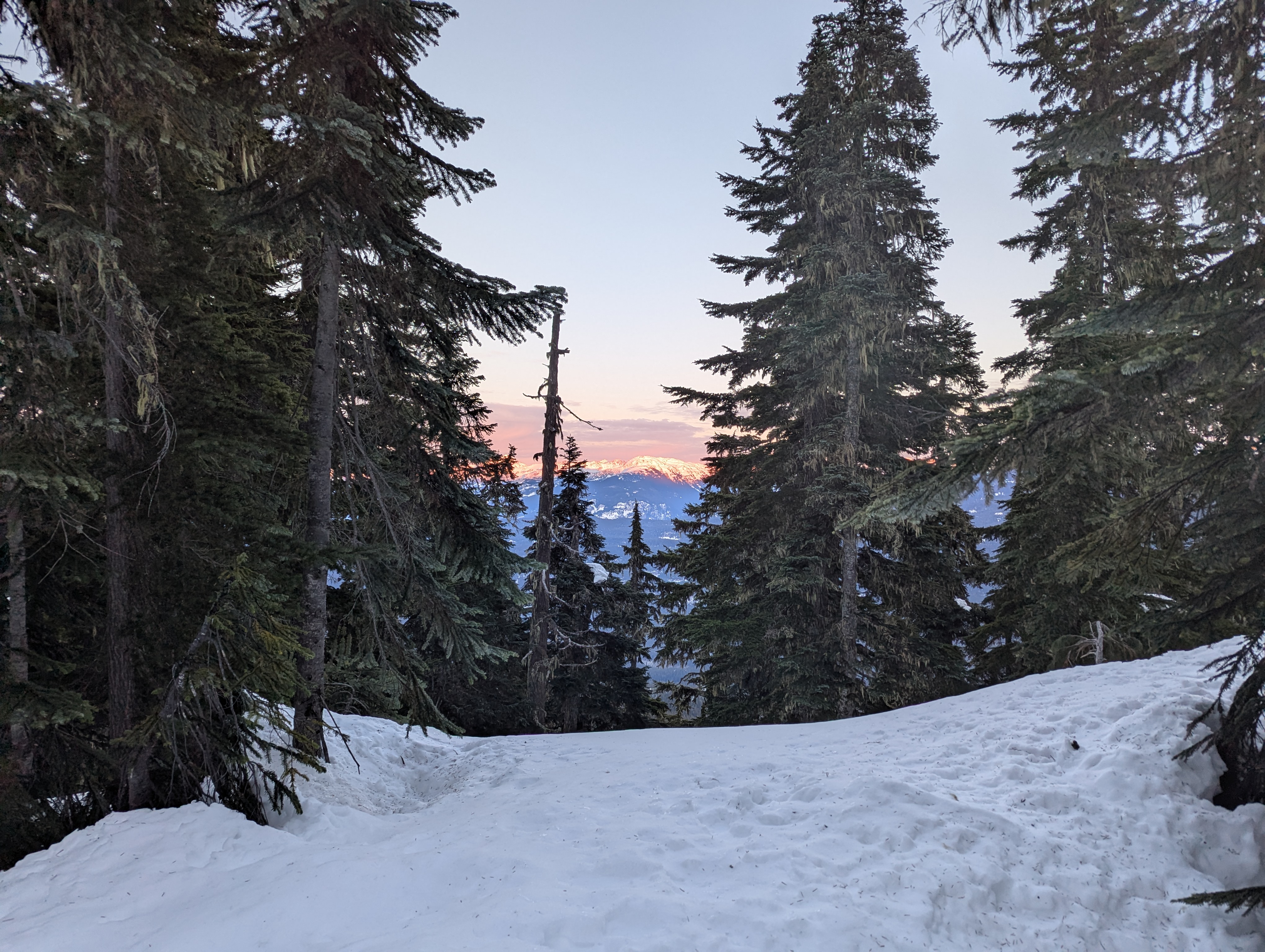 Sunset on a mountain across the valley