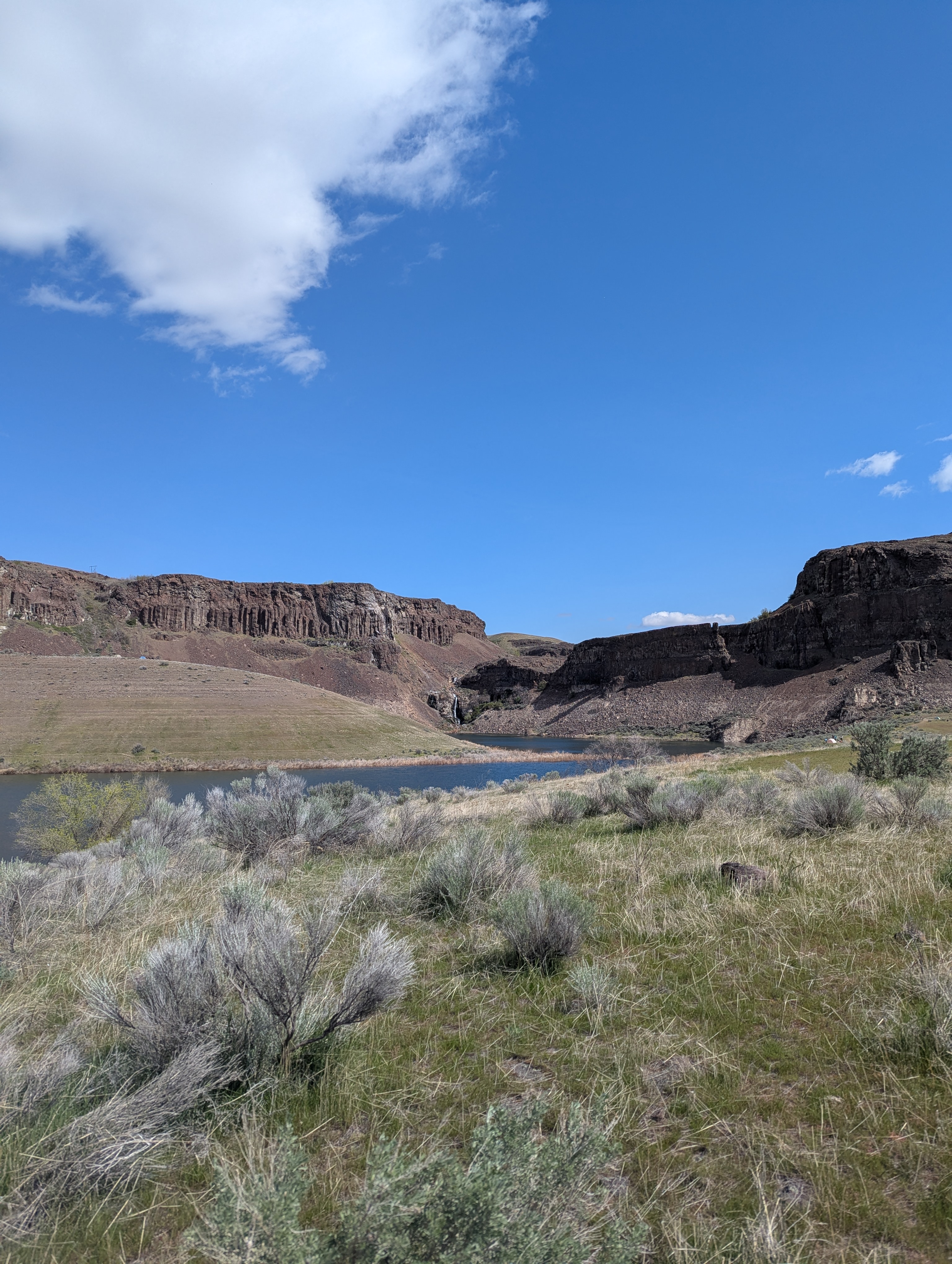 Two lakes, and a the same waterfall in the distance