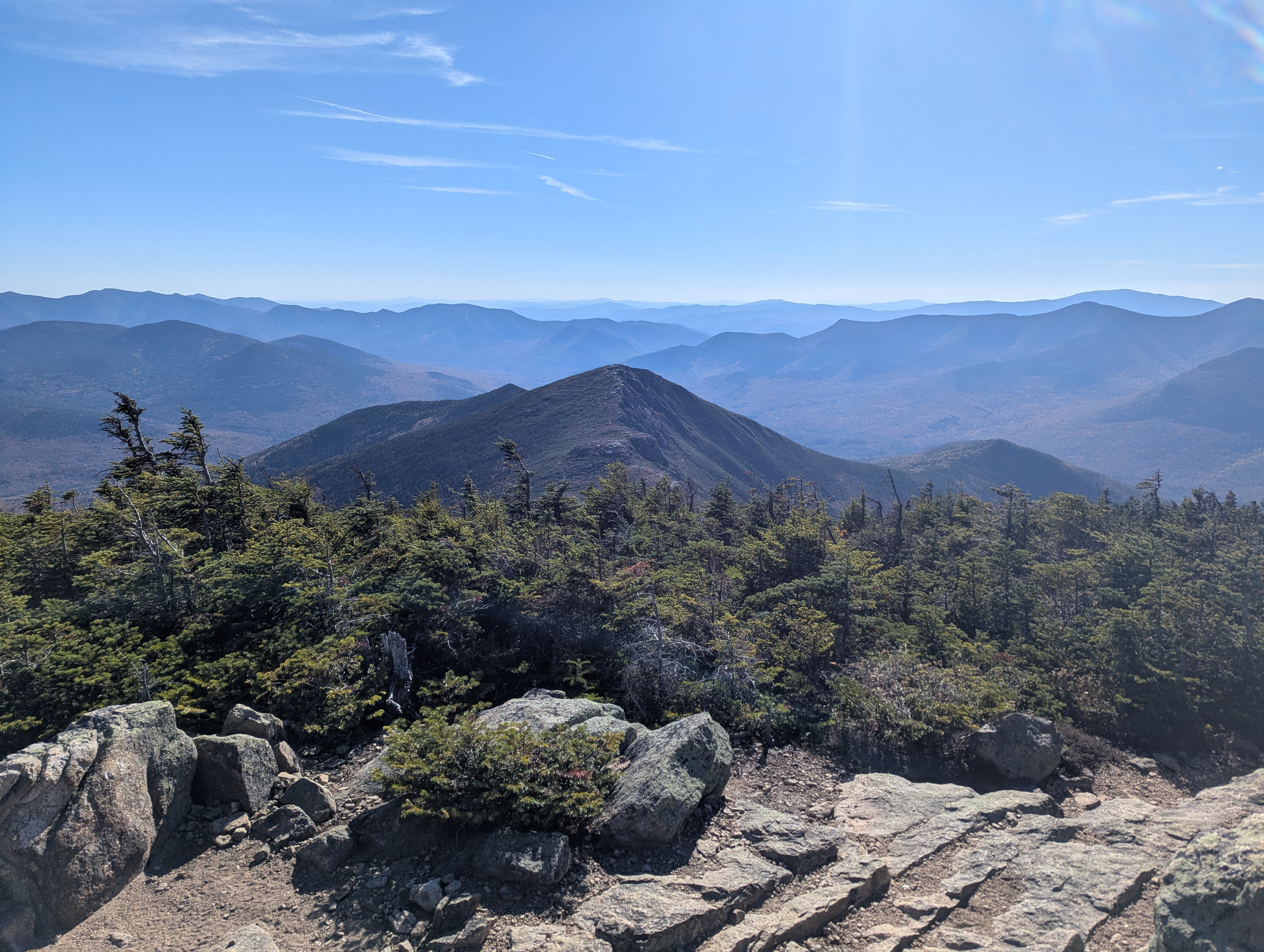 Another summit photo, with an exposed ridge in the middle distance below